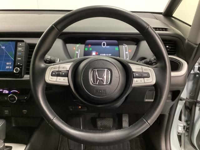 フィット e:HEVホーム 中古スタッドレスタイヤ、純正メモリーナビ、ドライブレコーダー前後装着+ETC付 当社デモカー 前後誤発進抑制機能 クリソナ 助手席エアバッグ 運転席エアバッグ 1オナ アイドリングストップ USB接続(14枚目)