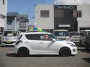 スイフト ＲＳ　キーレスエントリー　プッシュスタートエンジン　ディスプレイオーディオ　ＥＴＣ　パドルシフト　クルーズコントロール　社外足廻り　社外マフラー　社外アルミホイール　夏タイヤ新品装着済み（4枚目）