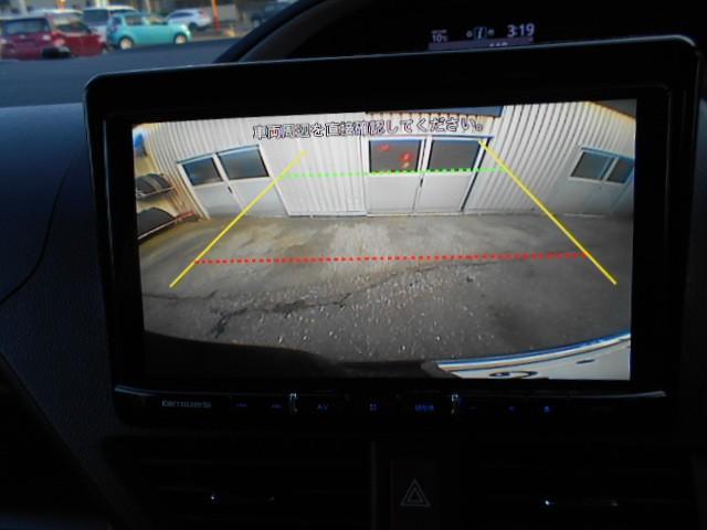 ヴォクシー ＺＳ　煌ＩＩＩ　４ＷＤ　乗車定員７人　両側電動スライドドア　メモリーナビ　フルセグＴＶ　バックカメラ　後席モニター　３列シート　アイドリングストップ　盗難防止システム　記録簿　衝突被害軽減システム　ＡＢＳ（6枚目）