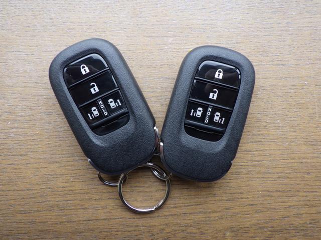 N-BOXカスタム ベースグレード 4WD ホンダセンシング 両側パワースライドドア レーダークルーズ ライトレベライザー フロント左右シートヒーター ミラーヒーター LEDヘッドライト 純正14インチAW 前後ソナー 1オーナー禁煙車(67枚目)