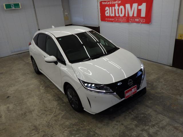 ノート Ｘ　ＦＯＵＲ　エマージェンシーブレーキ　純正ディスプレイオーディオ　ＬＥＤヘッドライト　フロント左右シートヒーター　ステアリングヒーター　クリアランスソナー　スタッドレスタイヤ積込ｉＧ６０　寒冷地仕様　禁煙車（52枚目）