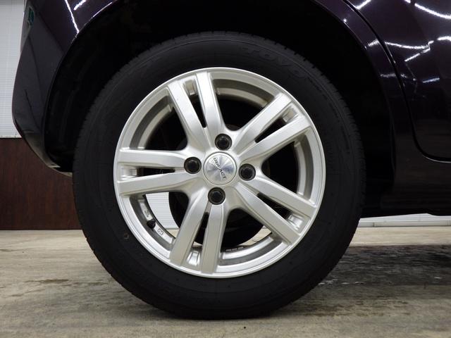 ワゴンR FX 4WD キーレスエントリー ライトレベライザー アイドリングストップ フロント左右シートヒーター ミラーヒーター 純正CDデッキ 社外フロアマット&ドアバイザー 社外14インチアルミホイール 禁煙車(54枚目)