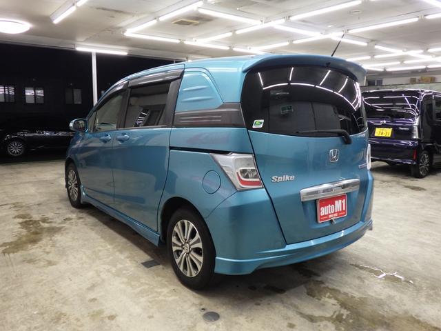 フリードスパイクハイブリッド ジャストセレクション MOPHDDナビ 地デジチューナーフルセグ バックカメラ 両側パワスラ オートクルーズ ETC 純正15インチAW スタッドレス社外AWセット付属 HID ハーフレザーシート ミラーヒーター 禁煙車(9枚目)