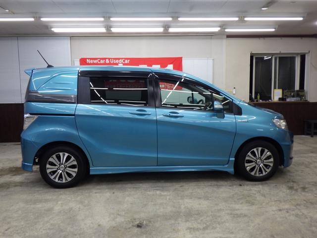 フリードスパイクハイブリッド ジャストセレクション MOPHDDナビ 地デジチューナーフルセグ バックカメラ 両側パワスラ オートクルーズ ETC 純正15インチAW スタッドレス社外AWセット付属 HID ハーフレザーシート ミラーヒーター 禁煙車(60枚目)