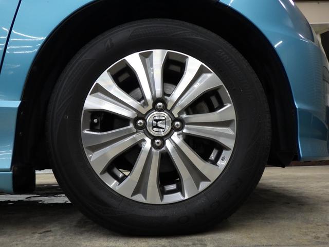 フリードスパイクハイブリッド ジャストセレクション MOPHDDナビ 地デジチューナーフルセグ バックカメラ 両側パワスラ オートクルーズ ETC 純正15インチAW スタッドレス社外AWセット付属 HID ハーフレザーシート ミラーヒーター 禁煙車(62枚目)