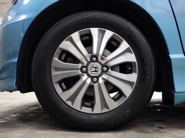 フリードスパイクハイブリッド ジャストセレクション MOPHDDナビ 地デジチューナーフルセグ バックカメラ 両側パワスラ オートクルーズ ETC 純正15インチAW スタッドレス社外AWセット付属 HID ハーフレザーシート ミラーヒーター 禁煙車(63枚目)