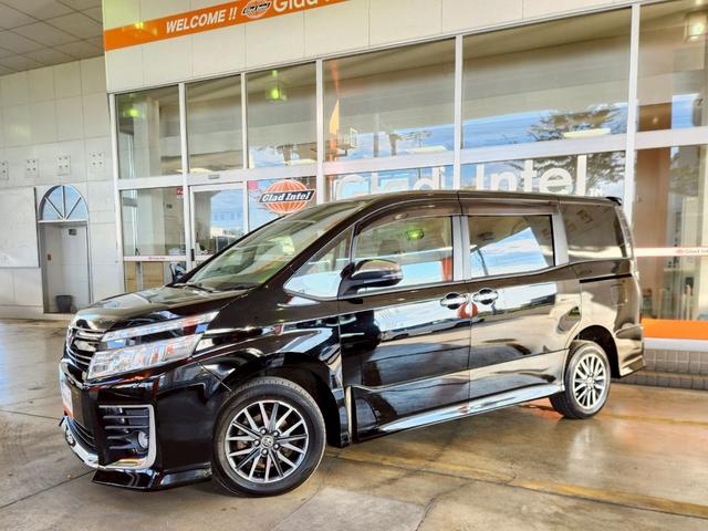 ヴォクシー ZS 煌 4WD Bluetooth対応9インチSDナビTV 後席モニター バックカメラ 両側電動ドア 衝突軽減ブレーキ レーンキープ LEDヘッドライト&オートハイビーム ステアリングリモコン 純正16AW(3枚目)