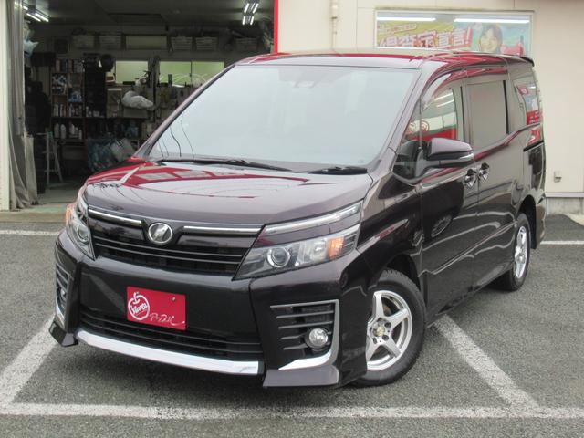 ヴォクシー ＺＳ　助手席サイドリフトアップシート　両側パワースライドドア　寒冷地仕様車　純正エンジンスターター　アルパインＳＤナビ　フルセグテレビ　バックカメラ　ＨＤＭＩ　社外１５インチアルミホイール　ＥＴＣ（2枚目）