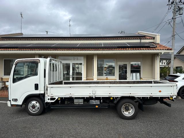 エルフトラック ロングフルフラットロー　ワンオーナー　４ＷＤ　５速マニアル　ターボ　標準ロングボディ　長さ４３４・幅１７９・アピトン張り　ＥＴＣ　運転席エアバッグ　ＡＢＳ　フォグ　切替え４ＷＤ　電動格納ミラー　荷台作業灯　精工ラック　記録簿（16枚目）