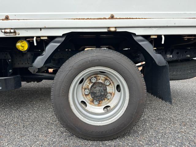 エルフトラック ロングフルフラットロー　ワンオーナー　４ＷＤ　５速マニアル　ターボ　標準ロングボディ　長さ４３４・幅１７９・アピトン張り　ＥＴＣ　運転席エアバッグ　ＡＢＳ　フォグ　切替え４ＷＤ　電動格納ミラー　荷台作業灯　精工ラック　記録簿（30枚目）