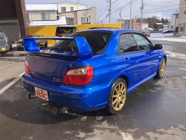 ＷＲＸ　ＳＴｉ　４ＷＤ　ターボ　６速マニュアル　メモリーナビ　フルセグＴＶ　ＣＤ　ＤＶＤ再生可能　キーレスエントリー　純正１７インチアルミ　ＡＢＳ　電動格納ミラー(12枚目)