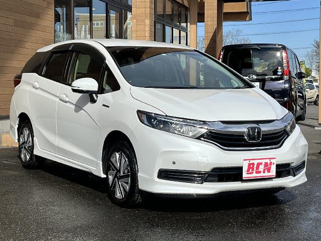 シャトル ハイブリッド ホンダセンシング 社外ナビ_Bluetooth音楽_ETC2.0_レーダークルーズコントロール_バックカメラ_純正ドアバイザー_純正フロアマット_ライトレベライザー_スペアキー有_スマートキー_禁煙車(2枚目)