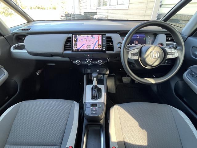 フィット ｅ：ＨＥＶネス　純正ＳＤナビ　フルセグＴＶ　バックカメラ　ホンダセンシング　Ｂｌｕｅｔｏｏｔｈ　アイドリングストップ　純正アルミホイール　ＬＥＤヘッドライト　クルーズコントロール（16枚目）