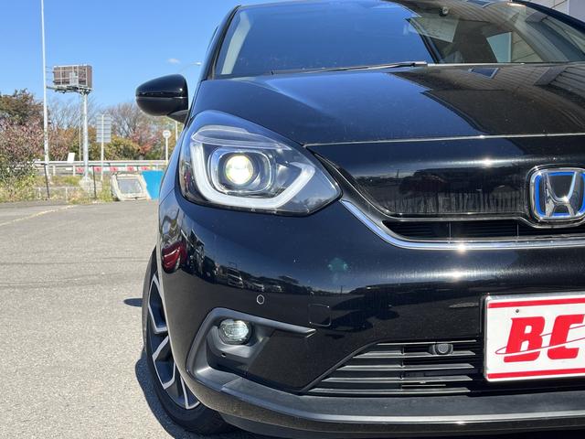 フィット ｅ：ＨＥＶネス　純正ＳＤナビ　フルセグＴＶ　バックカメラ　ホンダセンシング　Ｂｌｕｅｔｏｏｔｈ　アイドリングストップ　純正アルミホイール　ＬＥＤヘッドライト　クルーズコントロール（36枚目）