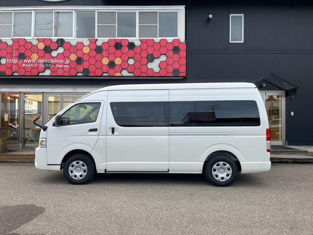 ハイエースバン DX GLパッケージ 070架装パッケージ寒冷地仕様イージークローザードアLEDヘッドランプ両側固定式ガラスパノラミックビューモニターデジタルインナーミラーリアクーラーヒーター助手席エアバッグフォースリミッター付ベルト(3枚目)
