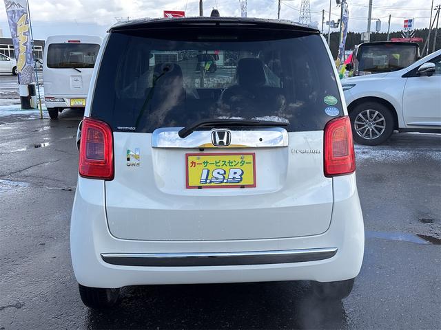 N-ONE プレミアム・Lパッケージ 4WD【修復歴無 禁煙車 純正ツートンカラー】ナビ TV バックカメラ ETC オートライト HIDライト スマートキー アイドリングストップ 電動格納ミラー ESC CD USB チップアップシート(6枚目)
