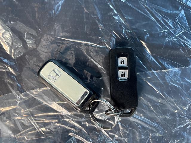 N-ONE プレミアム・Lパッケージ 4WD【修復歴無 禁煙車 純正ツートンカラー】ナビ TV バックカメラ ETC オートライト HIDライト スマートキー アイドリングストップ 電動格納ミラー ESC CD USB チップアップシート(49枚目)