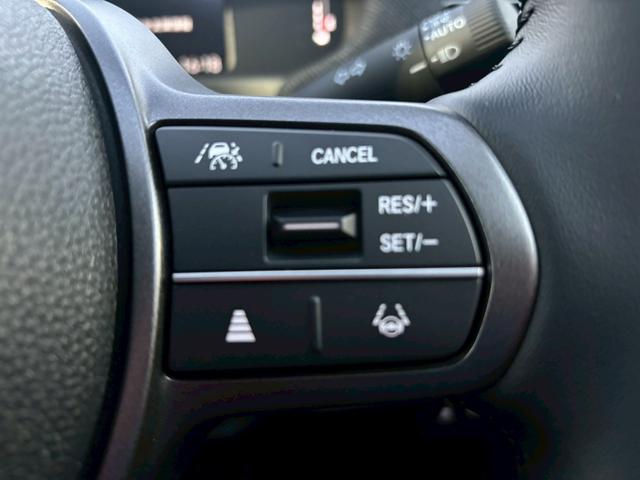 フリード ｅ：ＨＥＶエアー　ＥＸ【４ＷＤ／登録済み未使用車／６人乗り】　【１１．４型ナビ／ホンダセンシング／マルチビューカメラ】【ＥＴＣ２．０／ＬＥＤヘッドライト／ワイパー熱線】【フルセグＴＶ／ＢＴ接続】【電動パーキング／ブレーキホールド】【シートヒーター／ハーフレザー】（10枚目）