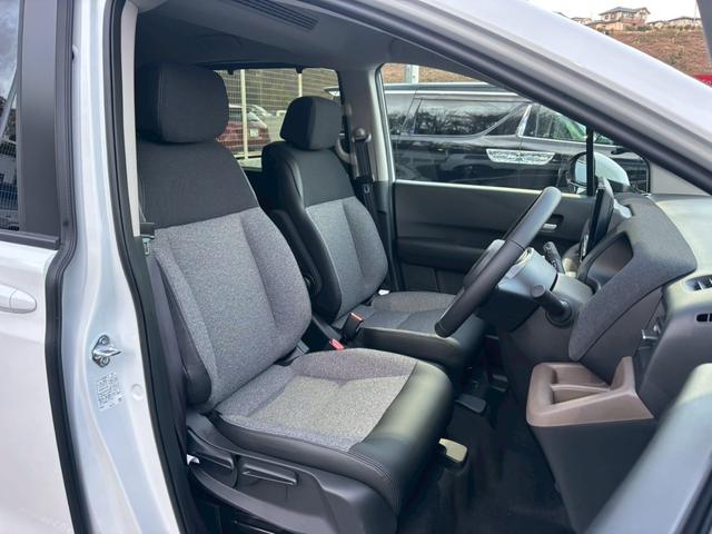 フリード ｅ：ＨＥＶエアー　ＥＸ【４ＷＤ／登録済み未使用車／６人乗り】　【１１．４型ナビ／ホンダセンシング／マルチビューカメラ】【ＥＴＣ２．０／ＬＥＤヘッドライト／ワイパー熱線】【フルセグＴＶ／ＢＴ接続】【電動パーキング／ブレーキホールド】【シートヒーター／ハーフレザー】（33枚目）