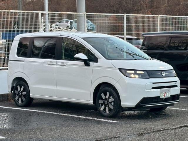 フリード ｅ：ＨＥＶエアー　ＥＸ【４ＷＤ／登録済み未使用車／６人乗り】　【１１．４型ナビ／ホンダセンシング／マルチビューカメラ】【ＥＴＣ２．０／ＬＥＤヘッドライト／ワイパー熱線】【フルセグＴＶ／ＢＴ接続】【電動パーキング／ブレーキホールド】【シートヒーター／ハーフレザー】（58枚目）