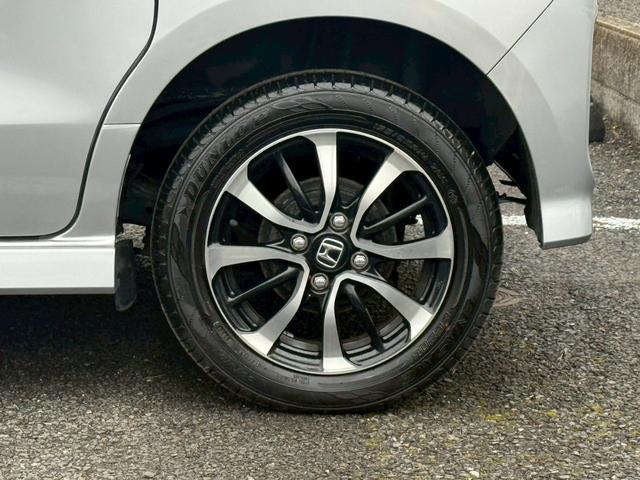 N-BOXカスタム G・Lホンダセンシング【夏&冬タイヤセット/4WD/禁煙車】 【純正エンジンスターター/衝突被害軽減システム/車線逸脱警告/クルコン】【電動スライドドア/イージークロージャー/ドライブレコーダー】【ETC/バックカメラ/シートヒーター】【ワンセグTV/BT接続】(32枚目)