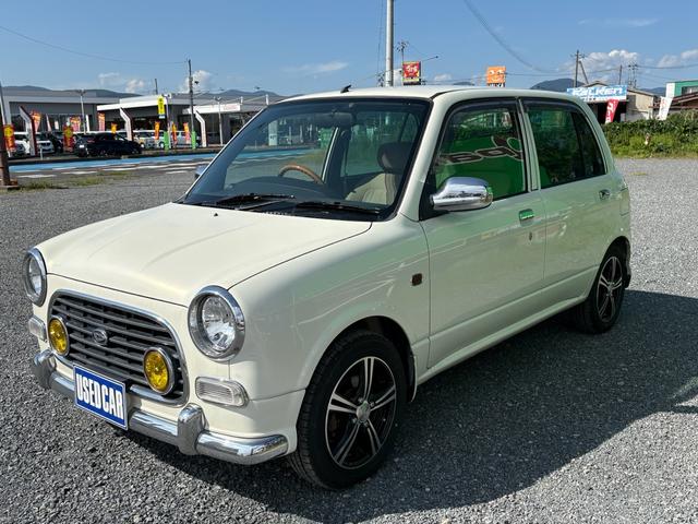 ミラジーノ ジーノターボ　ターボ　４ＷＤ　ナビ　ＴＶ　パワーステアリング　エアコン　パワーウインドウ　助手席エアバッグ　運転席エアバッグ　電動格納ミラー　キーレス　ＵＳＢ（3枚目）