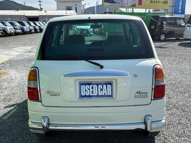 ミラジーノ ジーノターボ　ターボ　４ＷＤ　ナビ　ＴＶ　パワーステアリング　エアコン　パワーウインドウ　助手席エアバッグ　運転席エアバッグ　電動格納ミラー　キーレス　ＵＳＢ（7枚目）