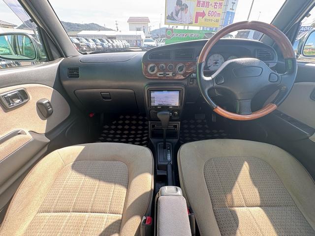 ミラジーノ ジーノターボ　ターボ　４ＷＤ　ナビ　ＴＶ　パワーステアリング　エアコン　パワーウインドウ　助手席エアバッグ　運転席エアバッグ　電動格納ミラー　キーレス　ＵＳＢ（26枚目）