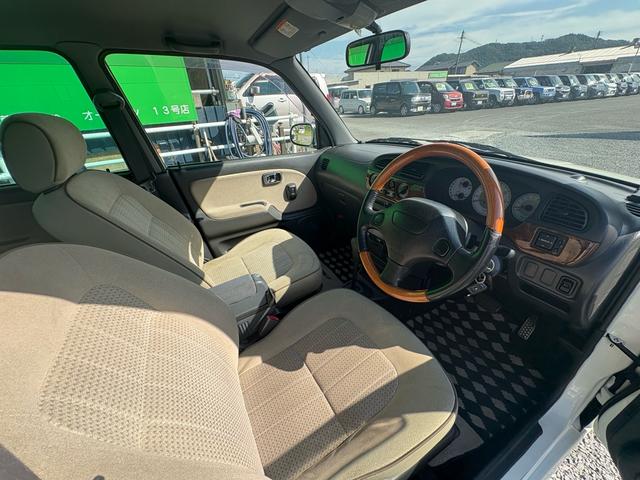 ミラジーノ ジーノターボ　ターボ　４ＷＤ　ナビ　ＴＶ　パワーステアリング　エアコン　パワーウインドウ　助手席エアバッグ　運転席エアバッグ　電動格納ミラー　キーレス　ＵＳＢ（34枚目）