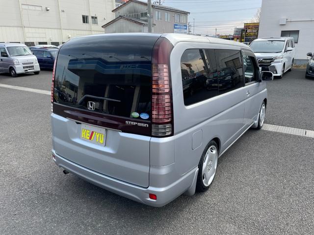 ハッピーエディション 禁煙車 社外SDナビ バックカメラ ETC フルセグTV DVD再生 BTオーディオ フルフラットシート 電動スライドドア 純正アルミ HKS車高調 2018年製スタッドレスタイヤ付 キーレス(2枚目)