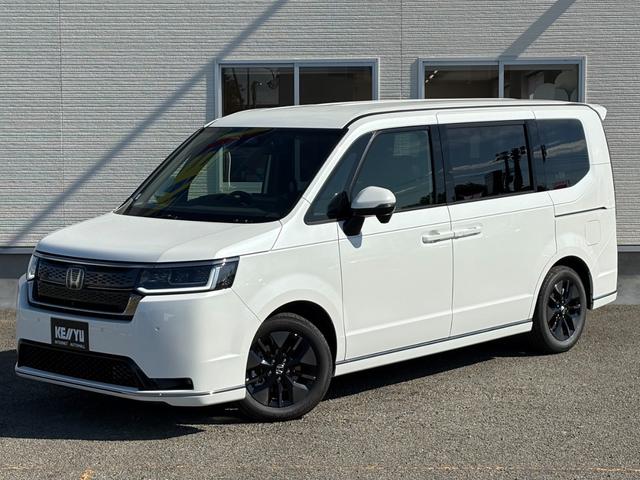 ステップワゴン ｅ：ＨＥＶスパーダ【登録済み未使用車】【１１．４インチナビ】　【１５．６インチフリップダウン＆マルチビューカメラ】【両側電動スライド／電動リアゲート】【ＢＳＭ／追従クルコン／衝突軽減】【シートヒーター／ハーフレザーシート】【フルセグＴＶ／ブルートゥース】ＬＥＤ（27枚目）