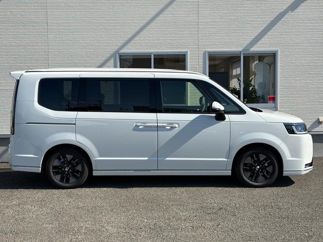 ステップワゴン ｅ：ＨＥＶスパーダ【登録済み未使用車】【１１．４インチナビ】　【１５．６インチフリップダウン＆マルチビューカメラ】【両側電動スライド／電動リアゲート】【ＢＳＭ／追従クルコン／衝突軽減】【シートヒーター／ハーフレザーシート】【フルセグＴＶ／ブルートゥース】ＬＥＤ（30枚目）