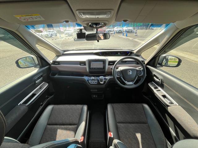 フリードハイブリッド ハイブリッド・クロスターホンダセンシング【4WD】純正ナビ 【衝突軽減システム】【追従クルーズコントロール】【両側電動スライドドア】【エンジンスターター】【バックカメラ】【ビルトインETC】【前後ドラレコ】【純正15インチアルミ】【LEDヘッドライト/フォグ】(9枚目)