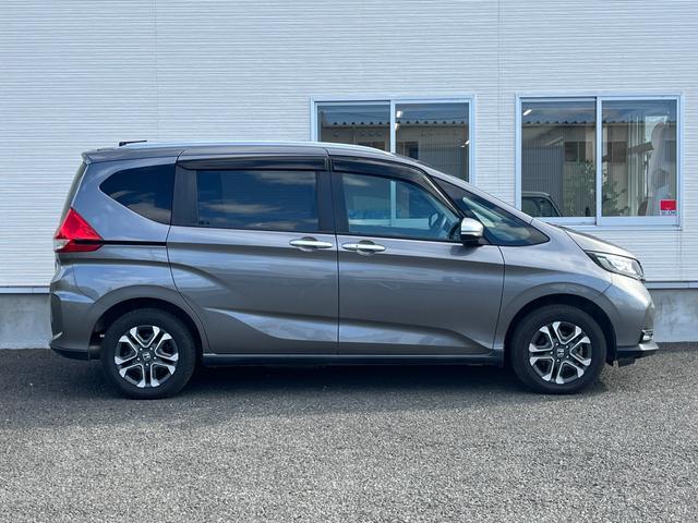 フリードハイブリッド ハイブリッド・クロスターホンダセンシング【4WD】純正ナビ 【衝突軽減システム】【追従クルーズコントロール】【両側電動スライドドア】【エンジンスターター】【バックカメラ】【ビルトインETC】【前後ドラレコ】【純正15インチアルミ】【LEDヘッドライト/フォグ】(23枚目)