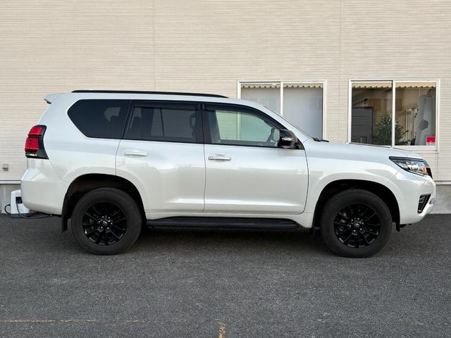 ランドクルーザープラド ＴＸ　Ｌパッケージ　７０ｔｈアニバーサリーリミテッド　７人乗　【４ＷＤディーゼル】後期【ワンオーナー禁煙車】【パノラミックビューモニター／メーカーナビ】【茶革シート／ベンチレーションシート】【専用１８インチ黒アルミ／ルーフレール】【追従クルコン】【前後ドラレコ】（28枚目）