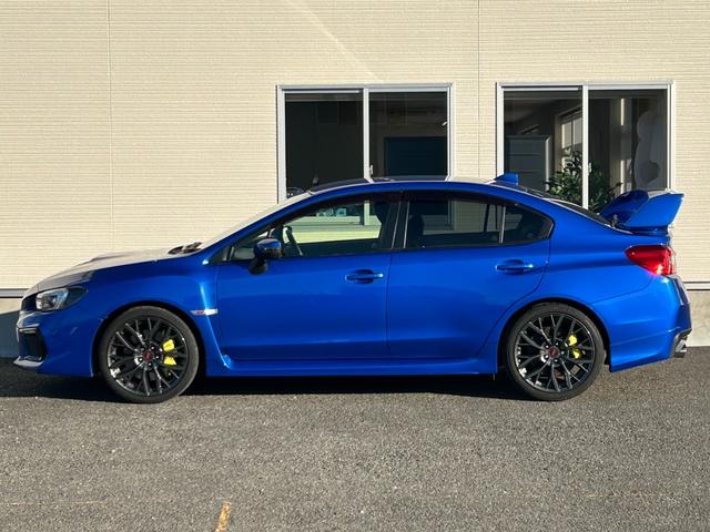 WRX STI STI タイプS【後期型】【6速MT】【大型スポイラー】 【イエローキャリパー/STi19インチアルミ/ビルシュタインショック】【8インチナビ/バックカメラ/フルセグTV/ブルートゥース】【シートヒーター/ハーフレザーシート】【LEDライト/LEDビーム】(28枚目)
