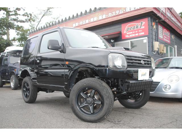 ジムニー ＸＧ　４ＷＤ　ターボ　関東オーナー車　関東仕入　２インチリフトアップ　ＥＴＣ　ＡＢＳキャンセラースイッチ　ＥＴＣ　３年間走行無制限保証　車検整備２年付き　サイドシルガード（2枚目）