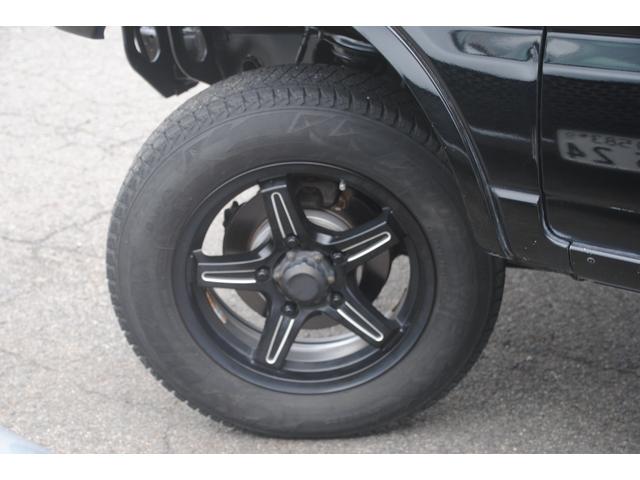 ジムニー ＸＧ　４ＷＤ　ターボ　関東オーナー車　関東仕入　２インチリフトアップ　ＥＴＣ　ＡＢＳキャンセラースイッチ　ＥＴＣ　３年間走行無制限保証　車検整備２年付き　サイドシルガード（27枚目）