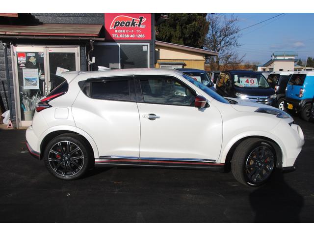 ジューク ニスモ　ＲＳ　４ＷＤ　８速ＣＶＴ　ＭＲ１６ＤＤＴニスモＲＳ専用チューン　ＲＳ専用大径ブレーキローター　キャリパーＲＳレッド　ＲＳエキゾースト　　３年間走行無制限保証　ＥＴＣ　全方位モニター　オートライト　寒冷地仕様（9枚目）