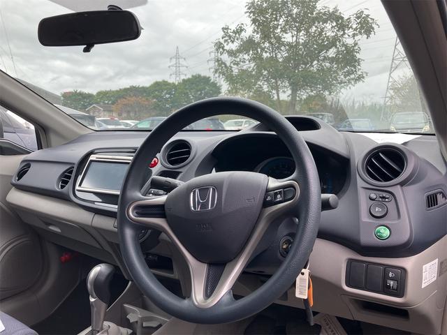 インサイト Ｇ　ＣＶＴ　キーレスエントリー　電動格納ミラー　盗難防止システム　ＣＤ　ＤＶＤ再生　ミュージックプレイヤー接続可　衝突安全ボディ　ＡＢＳ　エアコン　パワーステアリング　パワーウィンドウ（6枚目）