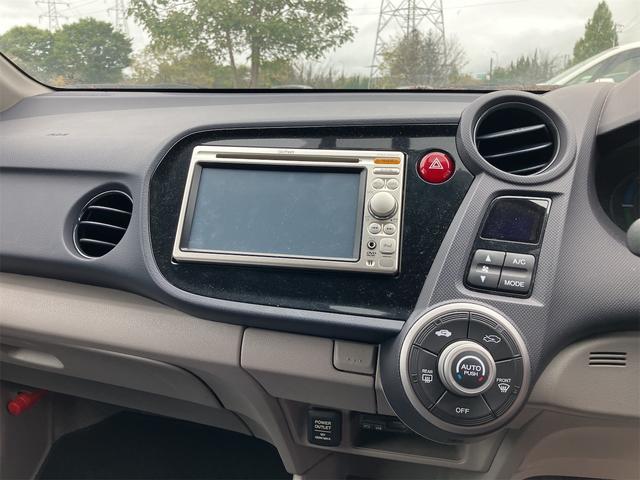 インサイト Ｇ　ＣＶＴ　キーレスエントリー　電動格納ミラー　盗難防止システム　ＣＤ　ＤＶＤ再生　ミュージックプレイヤー接続可　衝突安全ボディ　ＡＢＳ　エアコン　パワーステアリング　パワーウィンドウ（8枚目）