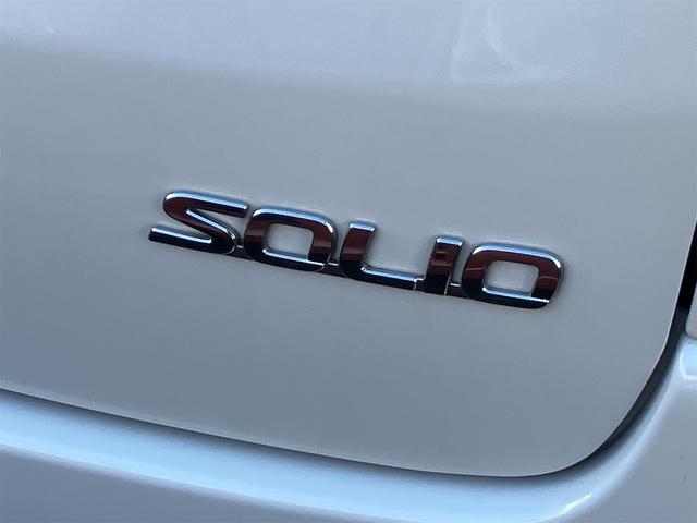 ソリオ ブラック＆ホワイト　両側電動スライドドア　オートライト　ＨＩＤ　スマートキー　フルフラット　ウォークスルー　ＣＶＴ　アルミホイール　盗難防止システム　衝突安全ボディ　ＡＢＳ　エアコン　パワーステアリング　パワーウィンドウ（11枚目）
