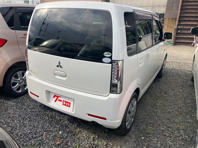 ｅＫワゴン Ｍ　キーレスエントリー　電動格納ミラー　ベンチシート　ＡＴ　盗難防止システム　ＣＤ　衝突安全ボディ　エアコン　パワーステアリング　パワーウィンドウ（3枚目）