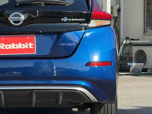 リーフ オーテック 純正ナビTV アラウンドビューモニター ハーフレザーシート シートヒーター スマートインナーミラー プロパイロット BSM ETC ハンドルヒーター フロアマット 純正17インチアルミ スマートキー(12枚目)