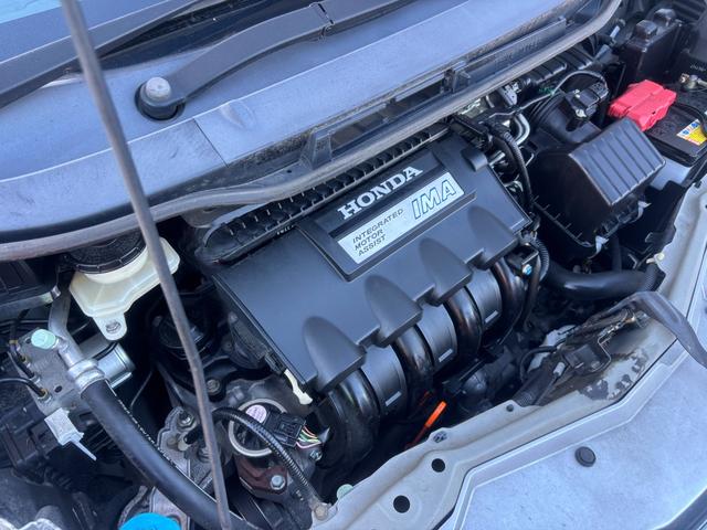 フィットハイブリッド ナビプレミアムセレクション ナビ Bカメ ワンセグ クルコン Sヒーター ETC HID Aライト スマキー 電格ミラー Mウィンカー Dバイザー AAC ステアスイッチ CD DVD AW パドルシフト(29枚目)