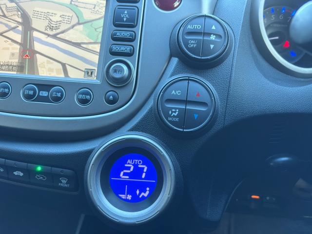 フィットハイブリッド ナビプレミアムセレクション ナビ Bカメ ワンセグ クルコン Sヒーター ETC HID Aライト スマキー 電格ミラー Mウィンカー Dバイザー AAC ステアスイッチ CD DVD AW パドルシフト(33枚目)