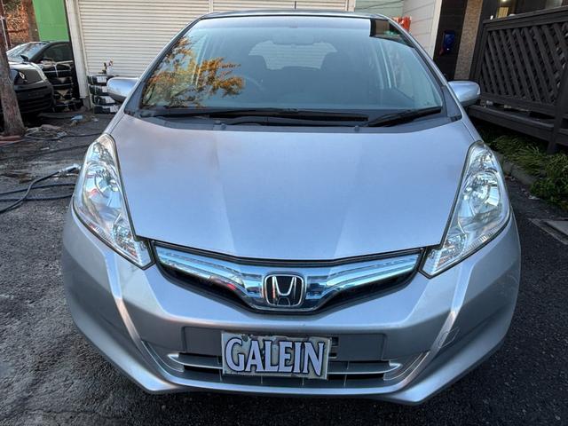 フィットハイブリッド ナビプレミアムセレクション ナビ Bカメ ワンセグ クルコン Sヒーター ETC HID Aライト スマキー 電格ミラー Mウィンカー Dバイザー AAC ステアスイッチ CD DVD AW パドルシフト(57枚目)