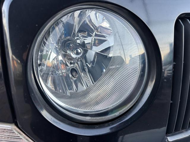 ジープ・パトリオット リミテッド　サンルーフ　ハーフレザーシート　前席シートヒーター　クルーズコントロール　ＥＴＣ　純正ＡＷ　キーレス　フォグ　純正オーディオ　禁煙　ドアバイザー　サイドカメラ（14枚目）