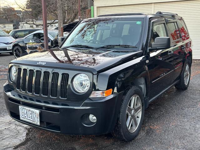 ジープ・パトリオット リミテッド　サンルーフ　ハーフレザーシート　前席シートヒーター　クルーズコントロール　ＥＴＣ　純正ＡＷ　キーレス　フォグ　純正オーディオ　禁煙　ドアバイザー　サイドカメラ（15枚目）