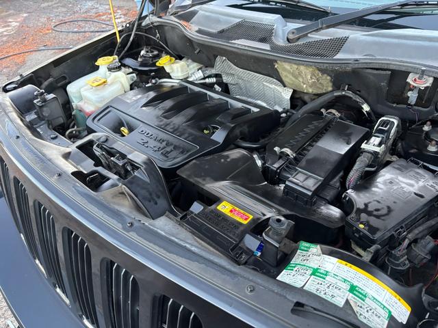 ジープ・パトリオット リミテッド　サンルーフ　ハーフレザーシート　前席シートヒーター　クルーズコントロール　ＥＴＣ　純正ＡＷ　キーレス　フォグ　純正オーディオ　禁煙　ドアバイザー　サイドカメラ（19枚目）